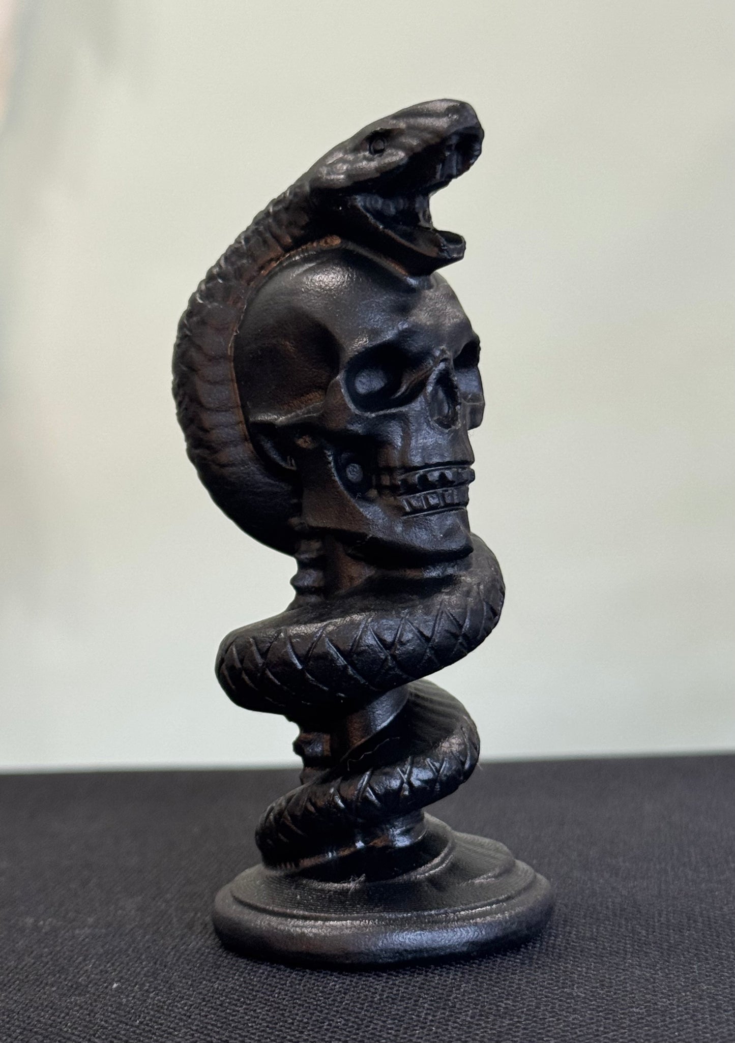 Obsidian Skull & Serpent Carving